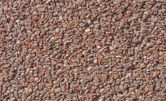 Granite chips for landscaping pebbles close-up. Texture, pattern, background.
