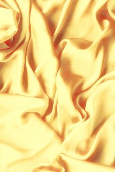 Luxury golden silk background texture - elegant fabric textures, abstract backgrounds and modern pastel colours concept