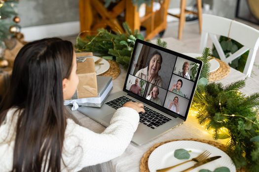 Virtual Christmas meeting team teleworking. Family video call remote conference Computer webcam screen view. party online.