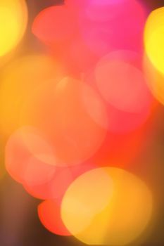 Colourful lights bokeh - abstract background, defocused overlay, bright colours concept