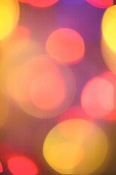 Colourful lights bokeh - abstract background, defocused overlay, bright colours concept