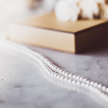 Valentine's day ideas, luxury shopping and holiday inspiration concept - Pearl jewellery in a vintage golden gift box