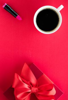 Romantic celebration, lifestyle and birthday present concept - Luxury beauty gift box and coffee on red, flatlay