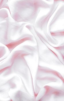 Elegant fabric texture, abstract backdrop and modern pastel colours concept - Pink soft silk waves, flatlay background