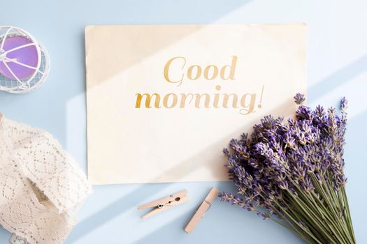 Text good morning top view on the table lavender, candle, lace. High quality photo