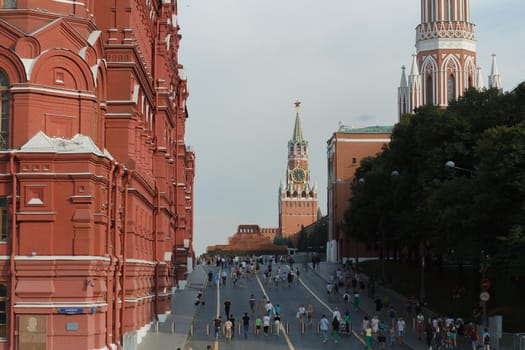 Moscow, Russia, 08.14.2022: People walk along the street decorated with floral decorations.