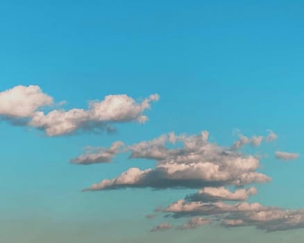 Sky azure turquoise colors, Clouds in the blue sky. Photo.