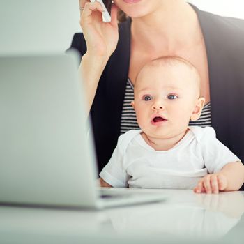 So this is work, huh. an adorable baby boy curious about his mothers work on her computer