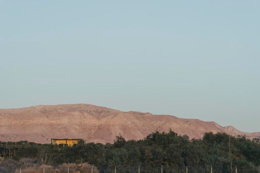 Orange sunrise reflecting off of the Dead Sea. High quality photo