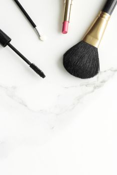 Make-up and cosmetics products on marble, flatlay background - modern feminine lifestyle, beauty blog and fashion inspiration concept