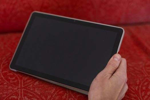 close up hands man using tablet connecting wifi.