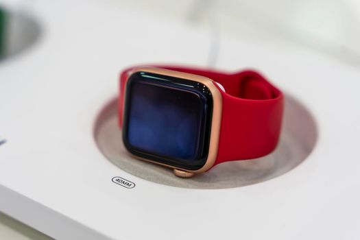 ST. PETERSBURG, RUSSIA - AUGUST 14, 2022: Close-up of an Apple Iwatch smartwatch in an electronics store window