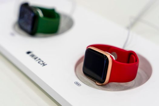 ST. PETERSBURG, RUSSIA - AUGUST 14, 2022: Close-up of an Apple Iwatch smartwatch in an electronics store window