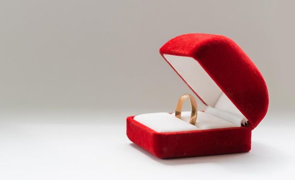 wedding ring in a red box.