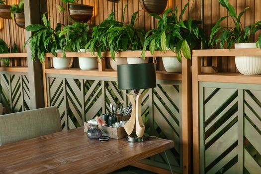 Cafe interior with elements of biophilic design. The concept of biophilia.