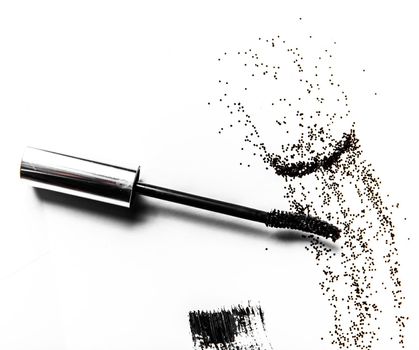 Beauty texture, cosmetic product and art of make-up concept - Black mascara brush stroke close-up isolated on white background