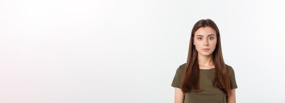 Portrait of a beautiful young woman looking at the camera and smiling, isolated on a white background