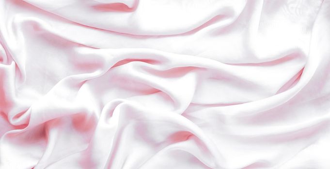 Elegant fabric texture, abstract backdrop and modern pastel colours concept - Pink soft silk waves, flatlay background