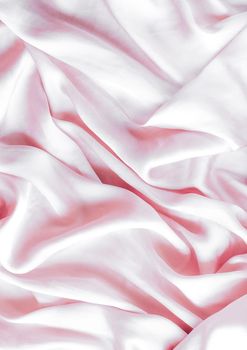 Elegant fabric texture, abstract backdrop and modern pastel colours concept - Pink soft silk waves, flatlay background