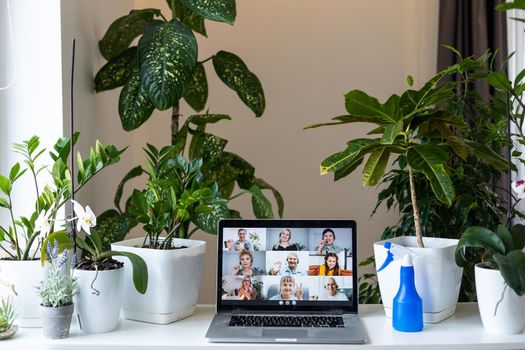 white desk and video chat online via a laptop. Video call, blogging. Workplace.