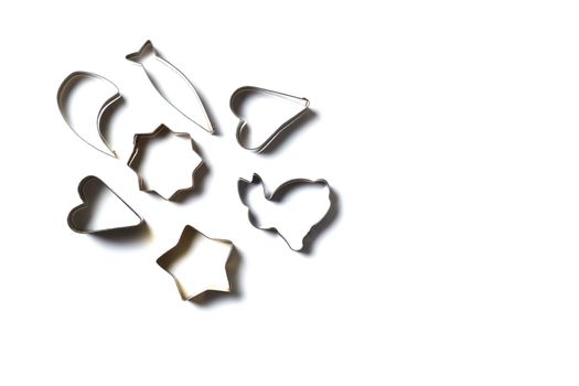 Metal cookie cutters on a white background. Copy space