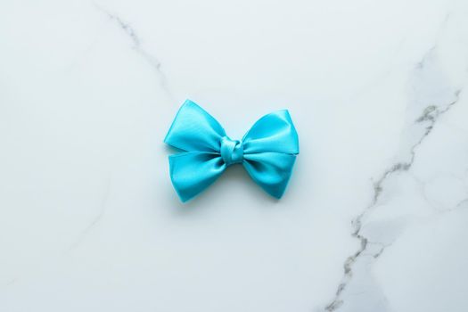 Holiday decor, feminine design and flatlay concept - Blue silk ribbon on marble, top view