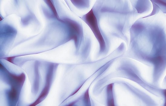 Elegant fabric texture, abstract backdrop and modern pastel colours concept - Purple soft silk waves, flatlay background