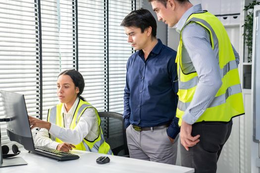 Competent engineers create blueprints and plans and present them to their boss. Architectural investors working with engineers for engineering project.