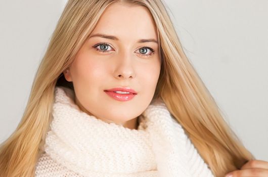 Autumn winter fashion and knitwear, beautiful woman wearing warm knitted scarf, close-up portrait