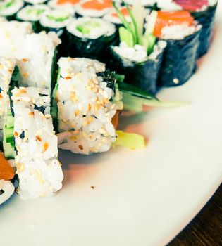 Food, travel and healthy eating concept - Japanese sushi in a restaurant at lunch time, asian cuisine