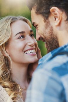 Close to you is all I want to be. an affectionate young couple having a romantic moment outdoors