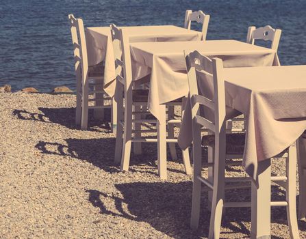 Summer holiday, eating out and beach life concept - Restaurant by the sea, Mediterranean vacation