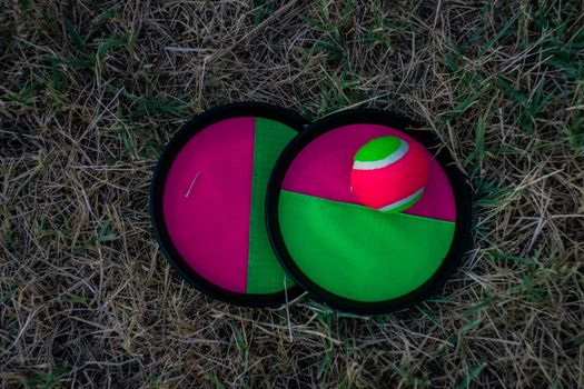 Plastic plates with ball for playing outdoor in the summer