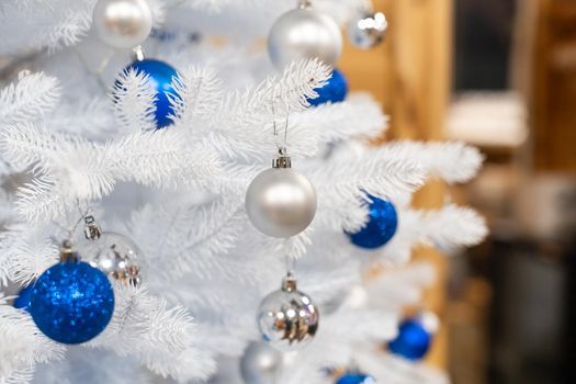 Close up of balls on christmas tree. background New Year concept