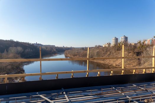 Restoration of the city bridge. New reinforcement binding have been laid, as well as cables and other communications protected by plastic casings. The plot is prepared for concreting.