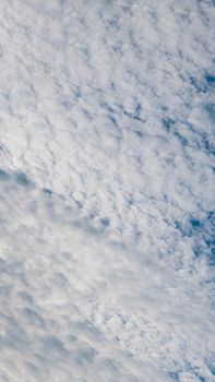 VERTICAL BANNER Atmosphere panorama white clouds azure blue sky Background summer open air freedom.