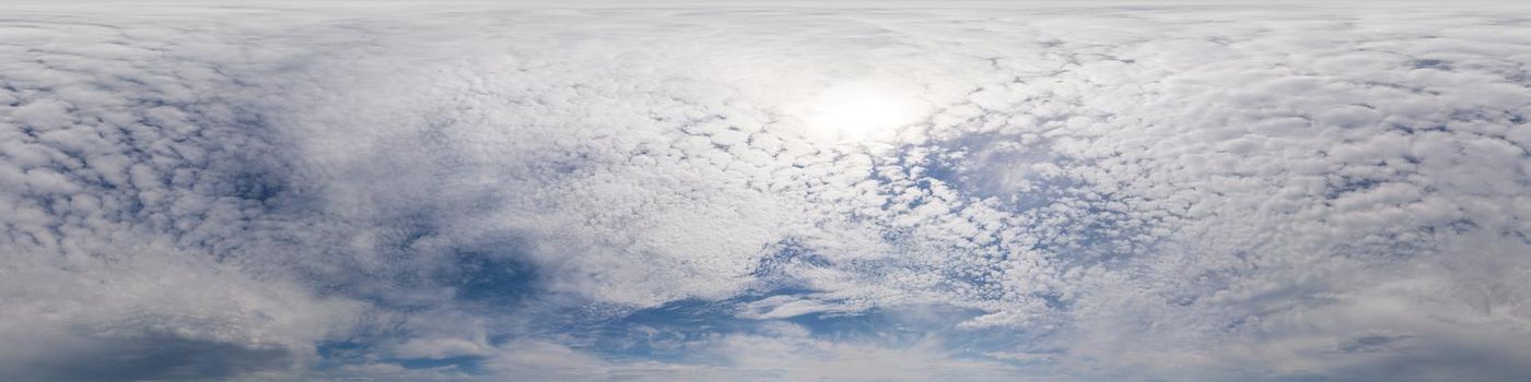 Blue sky with Cumulus clouds Seamless panorama in spherical equirectangular format. Complete zenith for use in 3D graphics, game and for composites in aerial drone 360 degree panoramas as a sky dome.