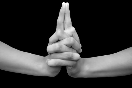Shot of a male hand showing kali mudra isolated on black background.