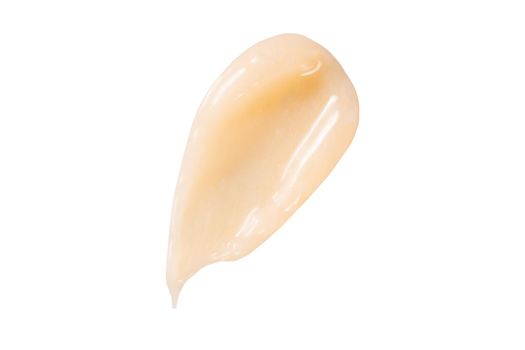 Hair conditioner cream swatch smear on white background. Yellow cosmetic lotion moisturiser sample closeup. Body care balm, retinol serum, shampoo wavy texture. Skincare mask, creamy cleanser product