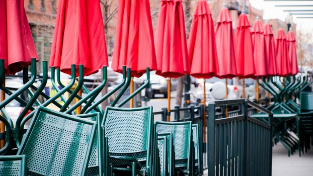 Red umbrellas in outdoor restaurant.