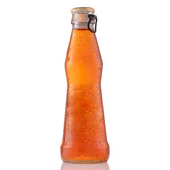 Iced cold aperol spritz cocktail in bottle, isolated on white background