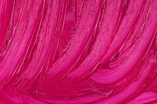 Liquid lipstick cosmetic. Purple cosmetics smear pattern. Beauty product sample closeup. Pink swatch matt backdrop. Makeup fashionable creamy texture stroke