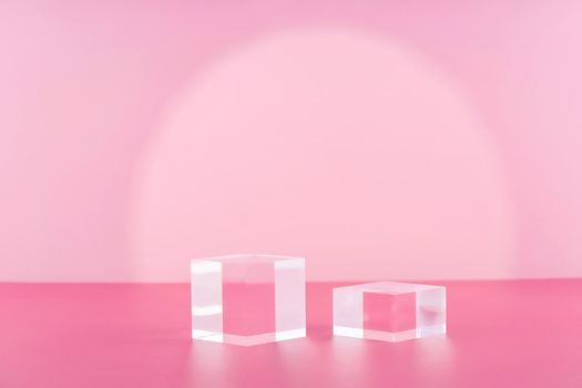 Acrylic blocks on pink background, pedestal cosmetic display glass podium platform for product presentation, geometric stand for cosmetics, mockup scene for jewellery, cosmetics mock up with spotlight