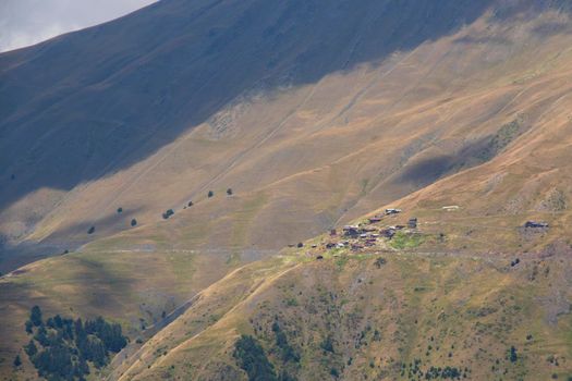 Tusheti mountain landscape and view, high angle, Georgian nature, clouds and forest