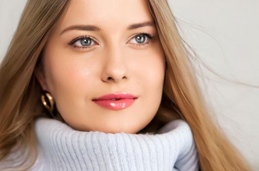 Autumn winter fashion and knitwear, beautiful woman wearing warm knitted sweater, close-up portrait