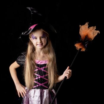 Cute halloween witch girl in fantasy costume, positive character, isolated on black background