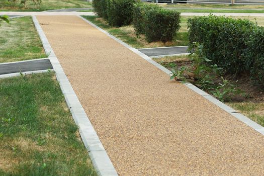 Small pebble road. Sidewalk pavement.