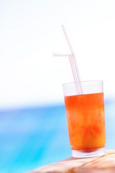 Cocktail by the sea - summer vacation, travel and summertime relax concept. Beach party time