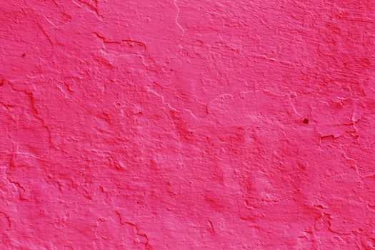 Damaged grunge background .Old red plaster wall texture .