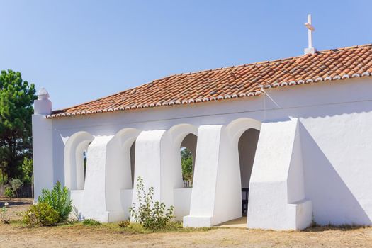 White ancient chapel building Saint Bartolomeu. Sines, Portugal